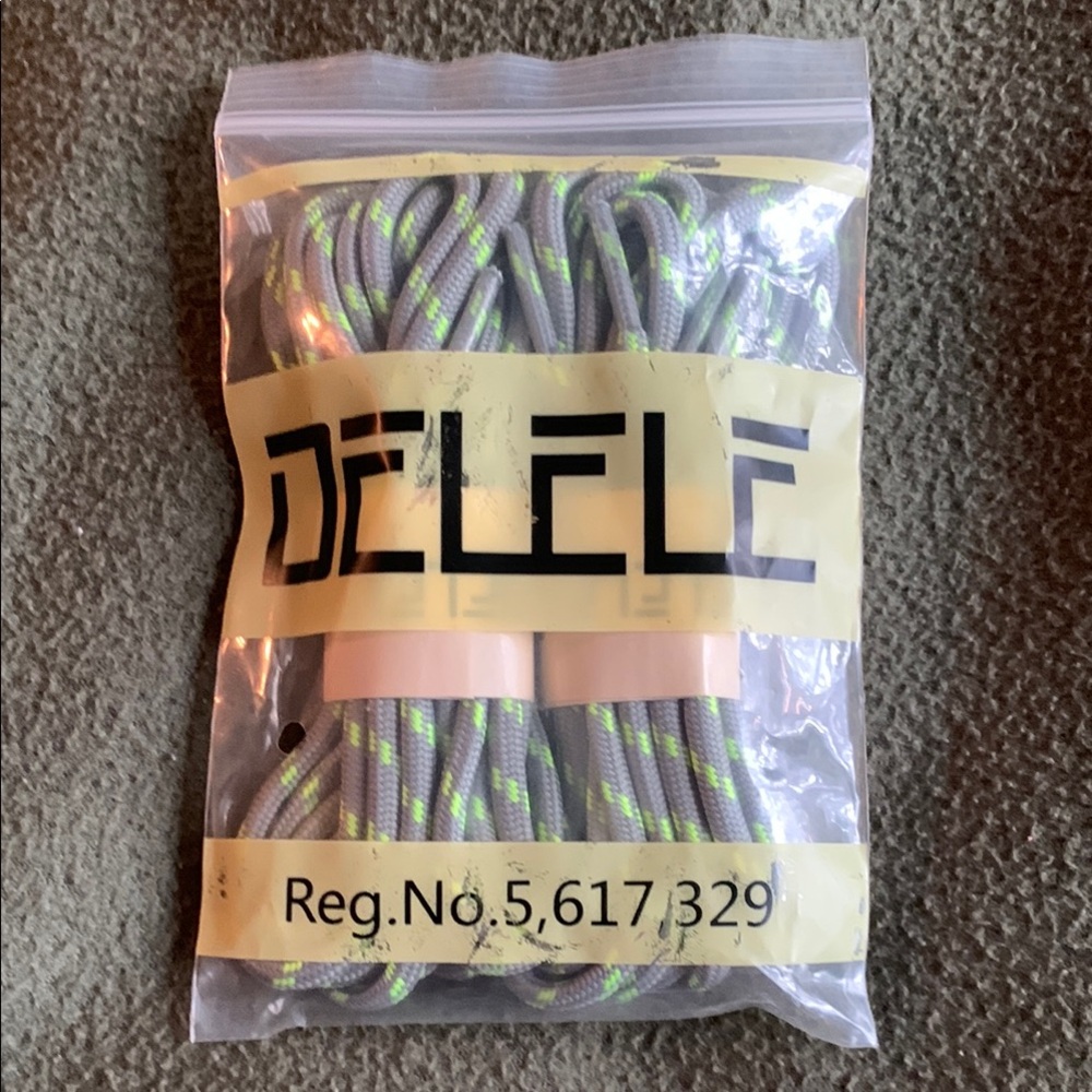 NIP Delele boot laces. 2 pairs. Green and grey. 62.99”